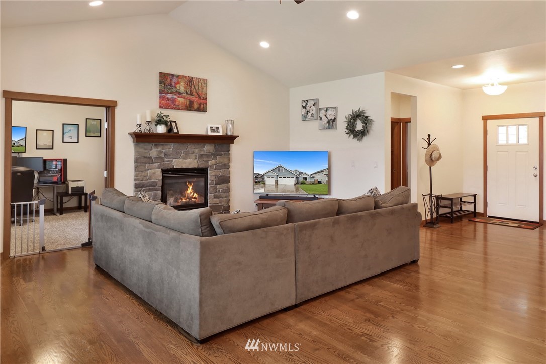 804 Red Maple Loop Everson, WA 98247 - Photo 12 of 40 a living room with furniture and a fireplace
