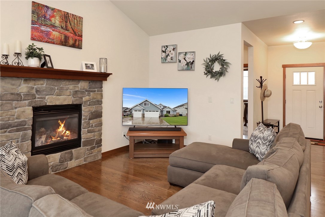 804 Red Maple Loop Everson, WA 98247 - Photo 15 of 40 a living room with furniture and a fireplace
