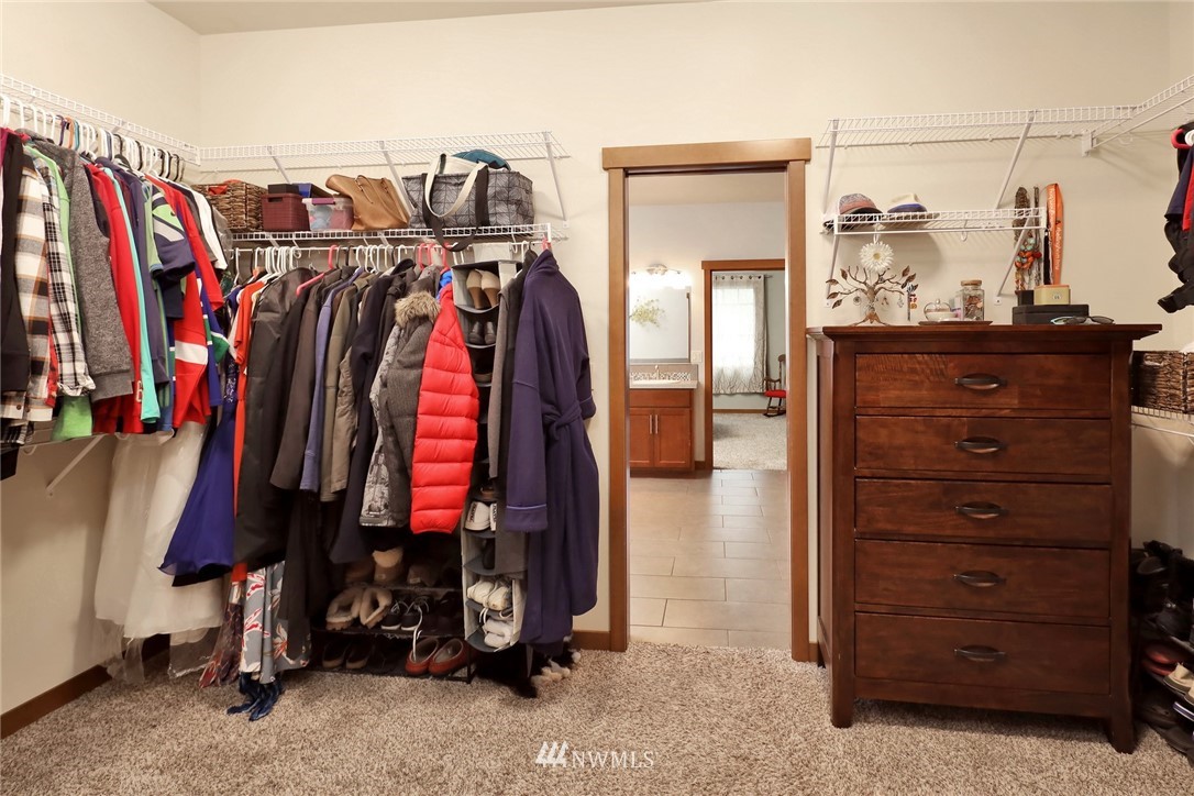 804 Red Maple Loop Everson, WA 98247 - Photo 27 of 40 a view of walk in closet with clothes
