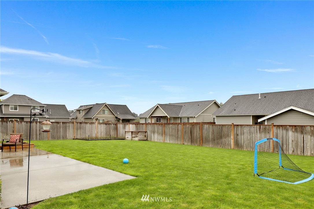 804 Red Maple Loop Everson, WA 98247 - Photo 35 of 40 a view of a house with a yard and a table