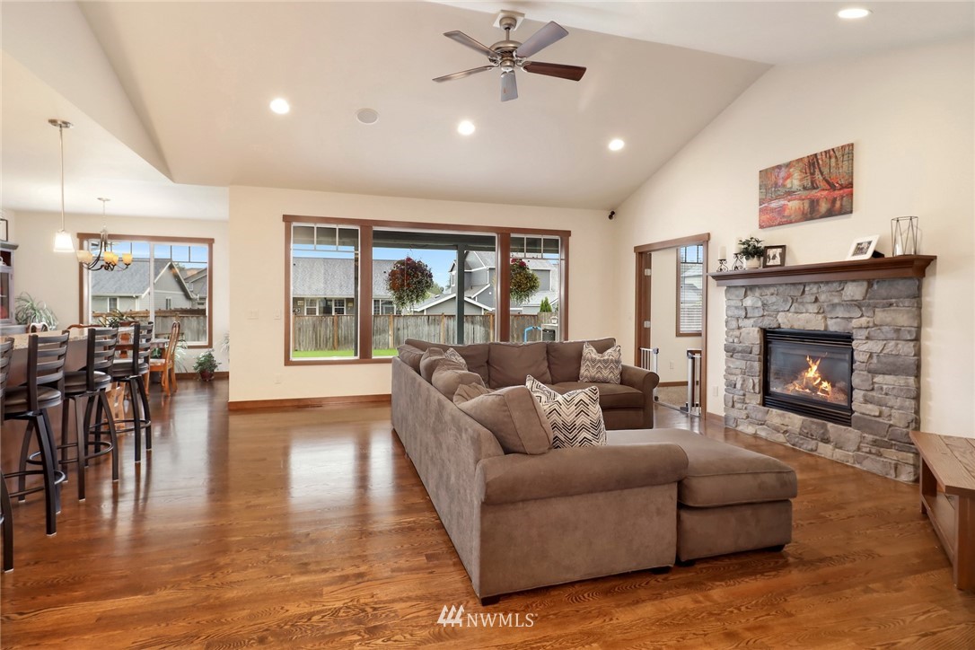 804 Red Maple Loop Everson, WA 98247 - Photo 5 of 40 a living room with furniture and a fireplace