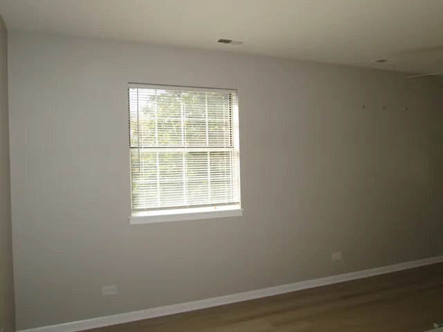 a kitchen with a stove and a refrigerator