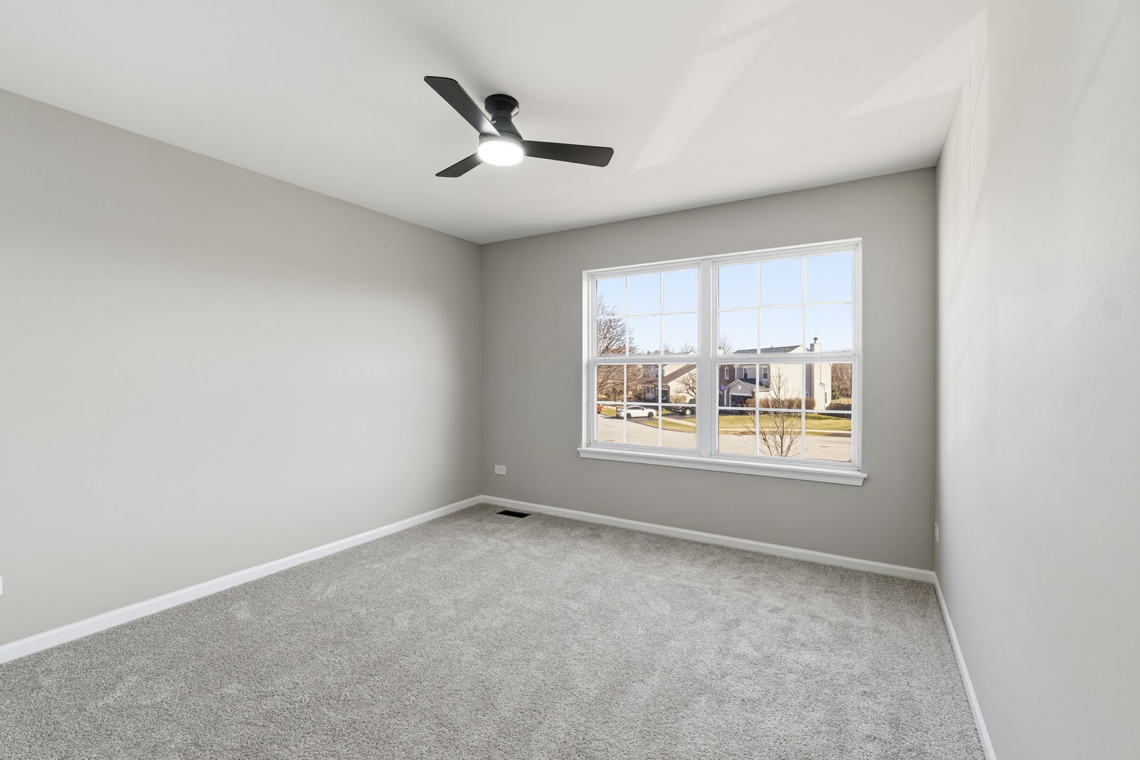 22718 Bass Lake Road Plainfield, IL 60544 - Photo 11 of 15 an empty room with a window