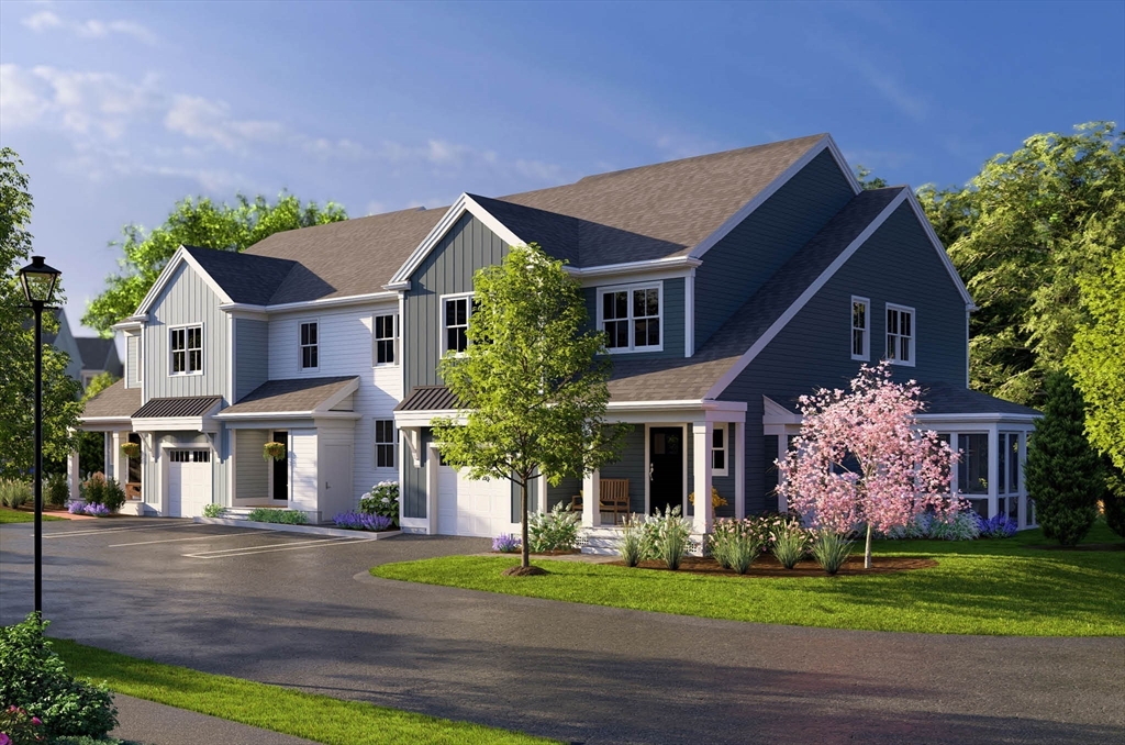 1 Maplewood Lane, Unit 333 Raynham, MA 02767 - Photo 2 of 18 front view of a house with a yard