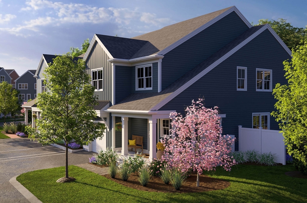 1 Maplewood Lane, Unit 333 Raynham, MA 02767 - Photo 3 of 18 front view of a house with a yard