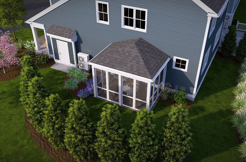 1 Maplewood Lane, Unit 333 Raynham, MA 02767 - Photo 7 of 18 a aerial view of a house next to a yard