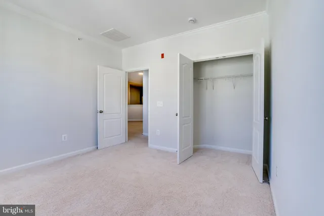 a bathroom with a toilet and a bathtub