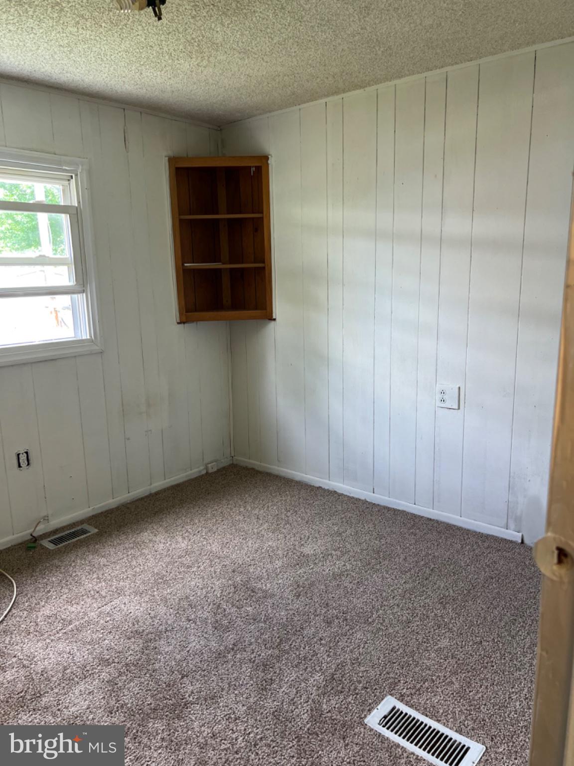 1302 Gibson Road, Unit 152 Bensalem, PA 19020 - Photo 14 of 18 a view of room with walk in closet and window