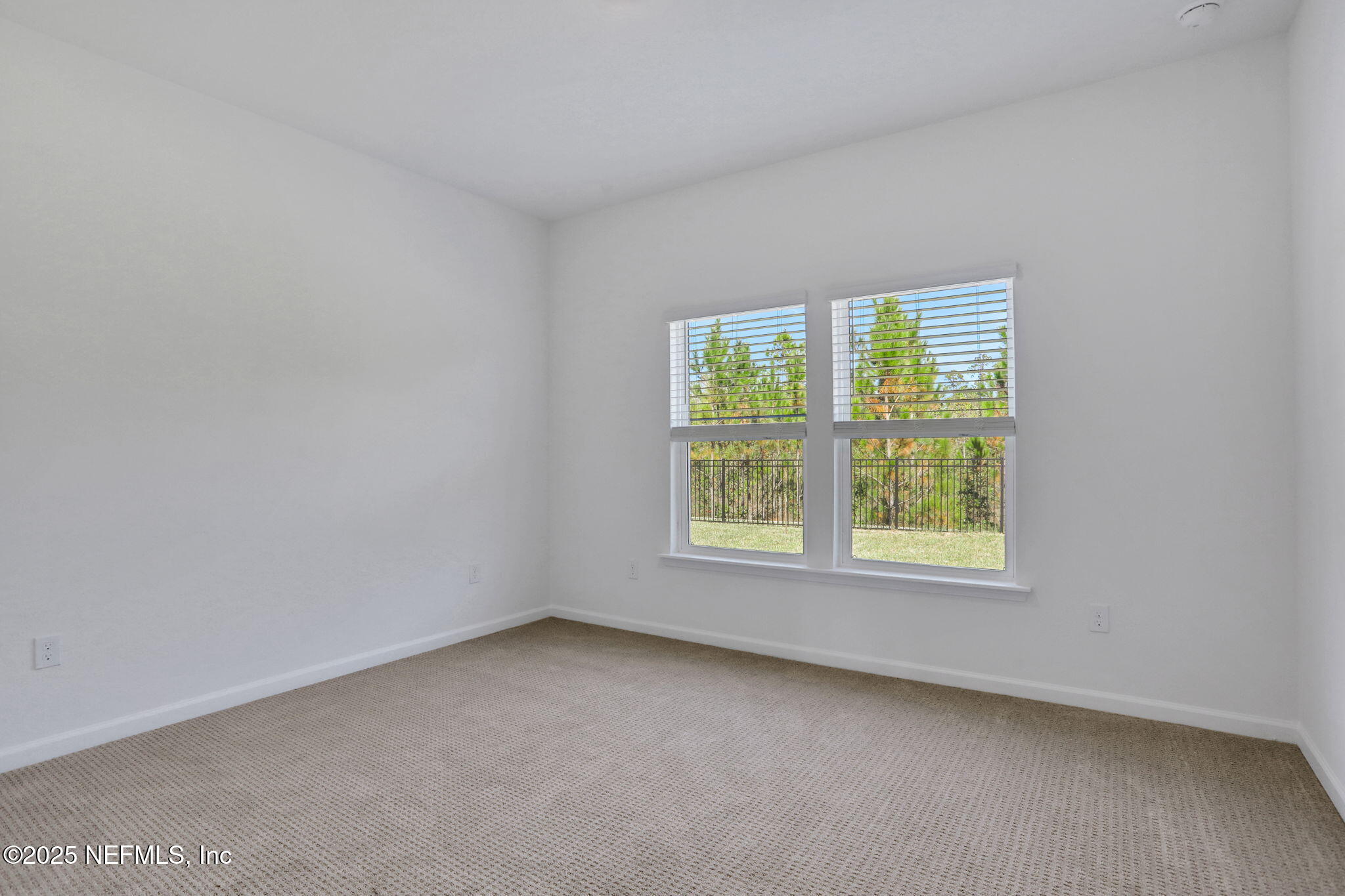 3257 Pipers Way Green Cove Springs, FL 32043 - Photo 28 of 42 an empty room with a window