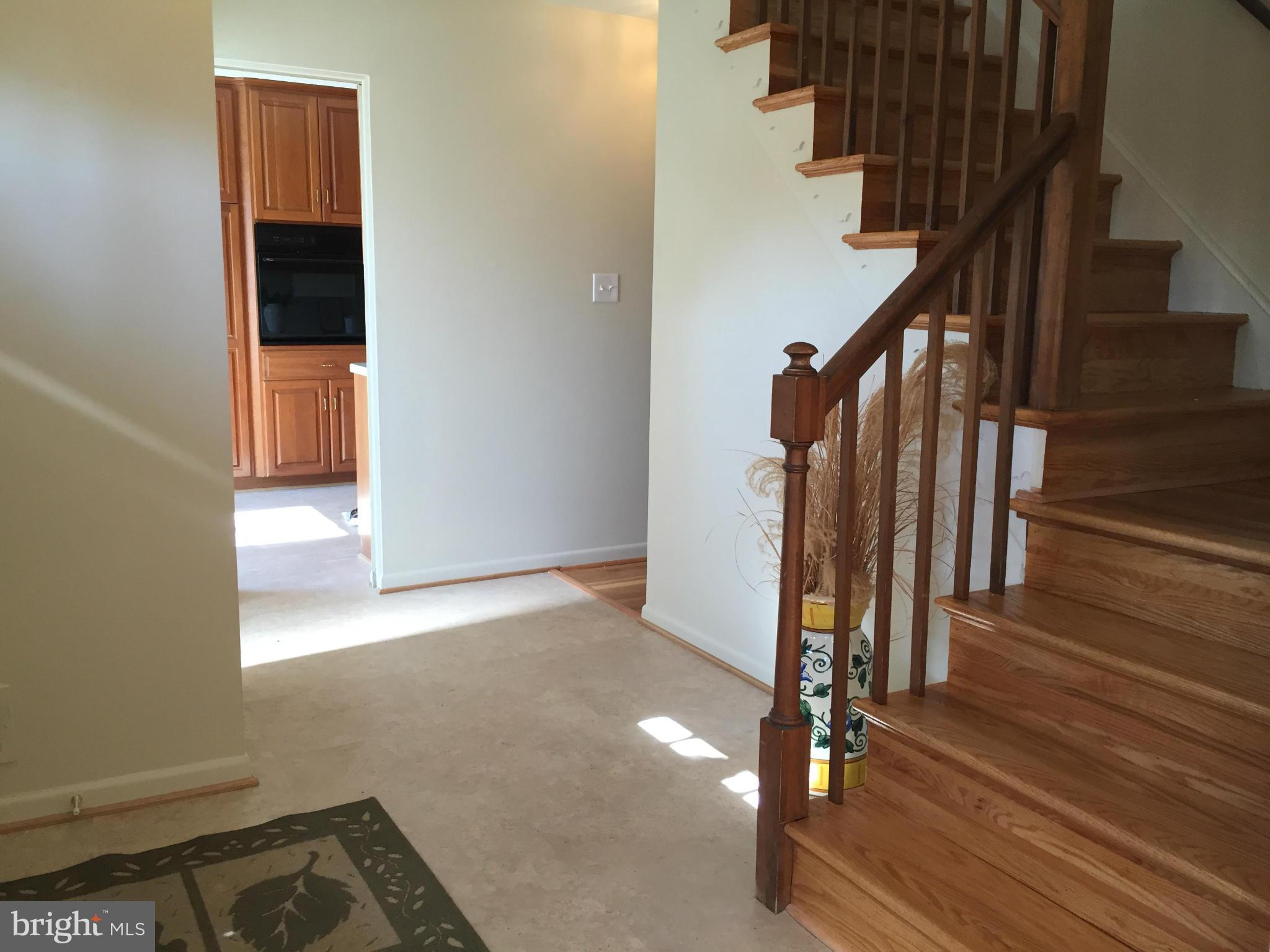 REFINISHED WOOD STAIRCASE TO UPPER LEVEL w 4 BR