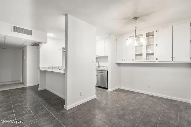 a view of a kitchen with a sink