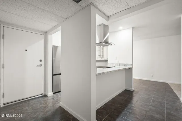 a view of a kitchen with a sink