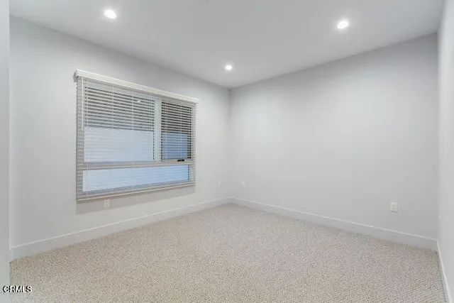 a bathroom with a toilet a sink and bathtub