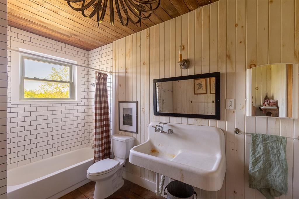 3183 Harrell Road Howe, TX 75459 - Photo 25 of 40 a bathroom with a sink toilet and shower