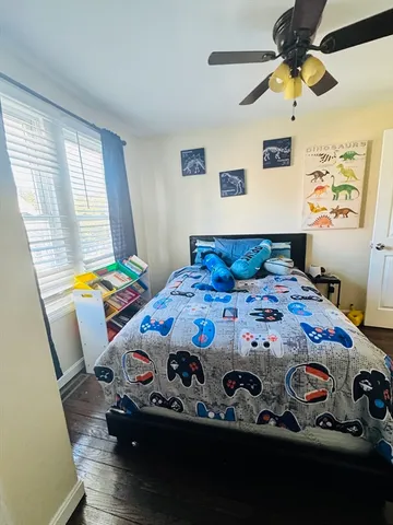 a bathroom with a sink toilet and mirror