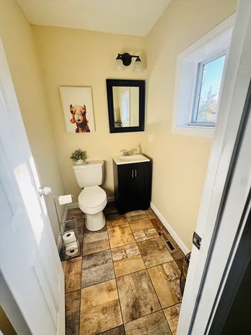 a bathroom with a sink and a toilet