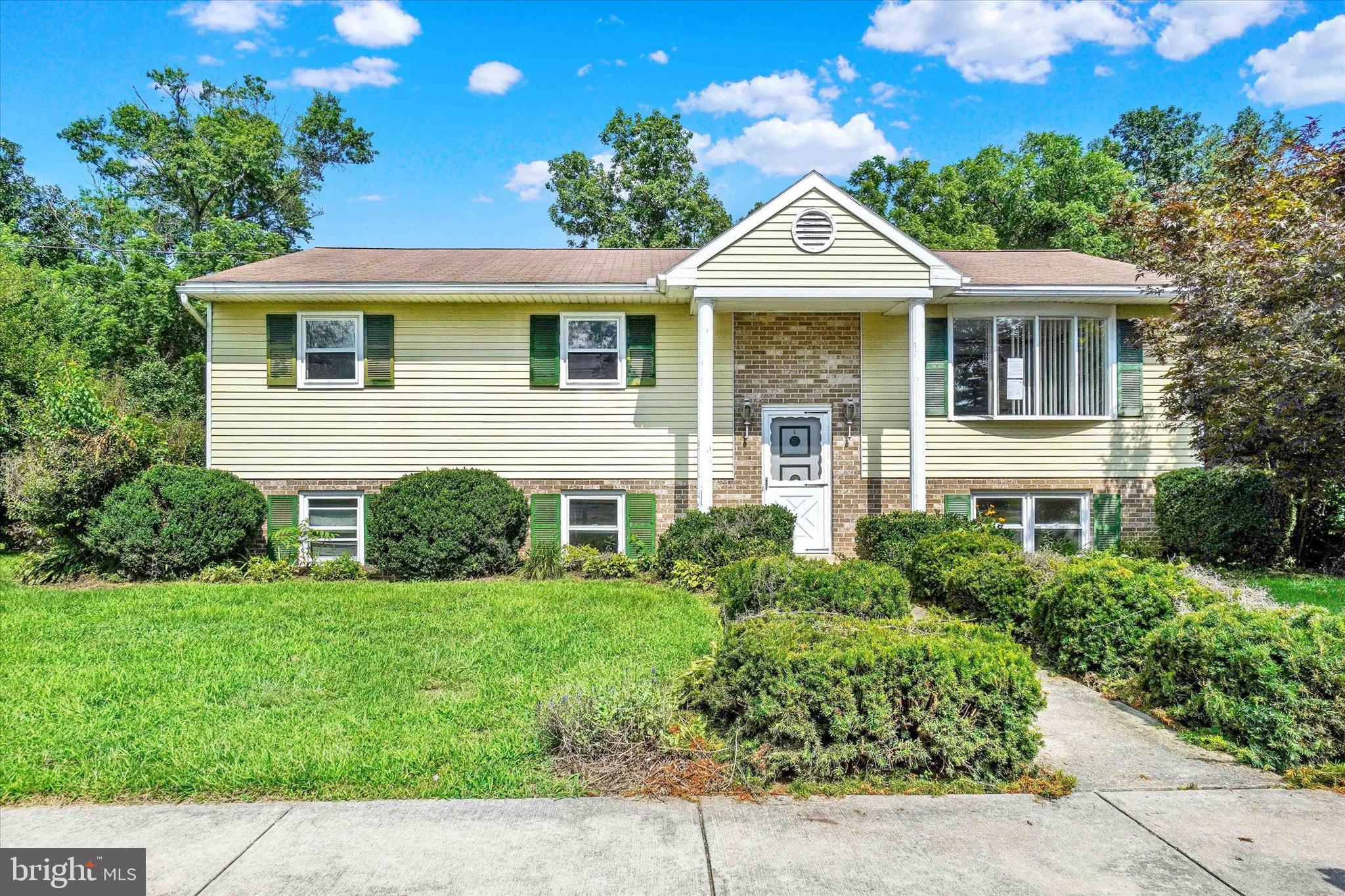 2700 Thornbridge Road East York, PA 17408 - Photo 1 of 18 a front view of a house with a yard