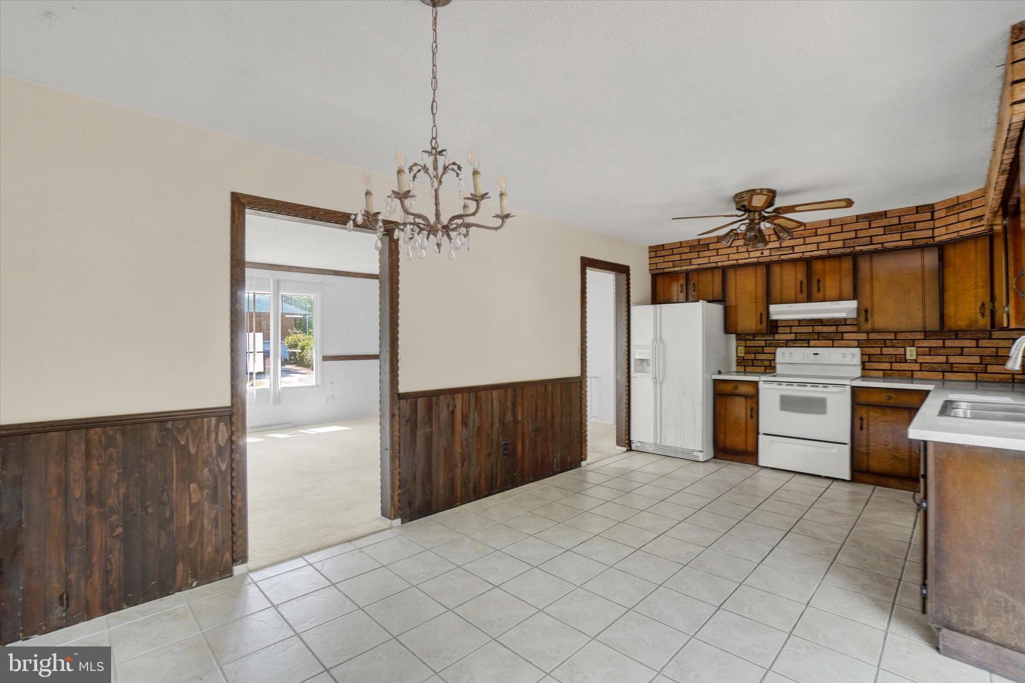 2700 Thornbridge Road East York, PA 17408 - Photo 6 of 18 a kitchen with stainless steel appliances a refrigerator and a stove top oven