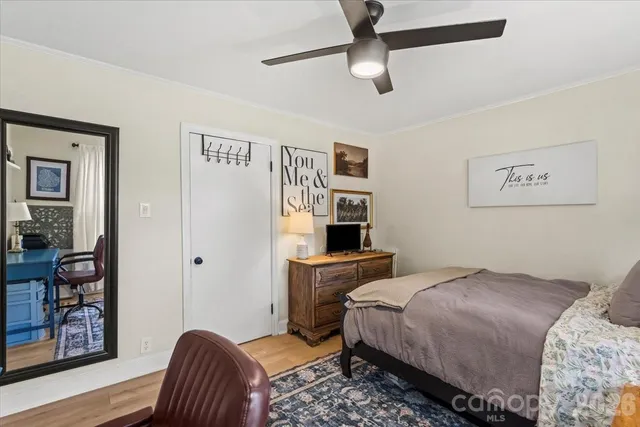 a view of an empty room with stairs
