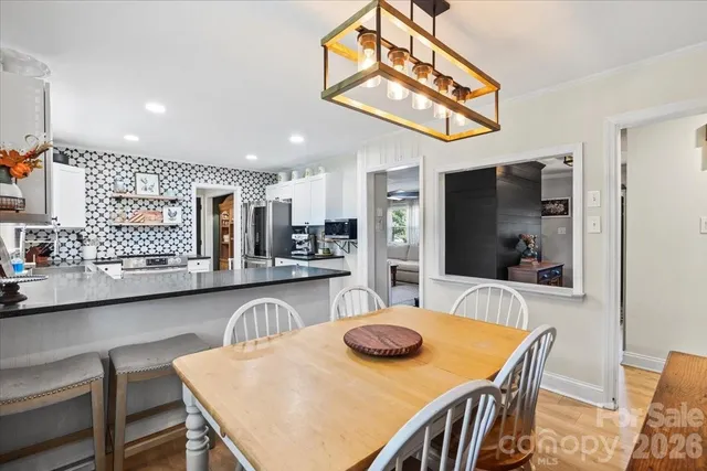 a kitchen with a sink stove and refrigerator