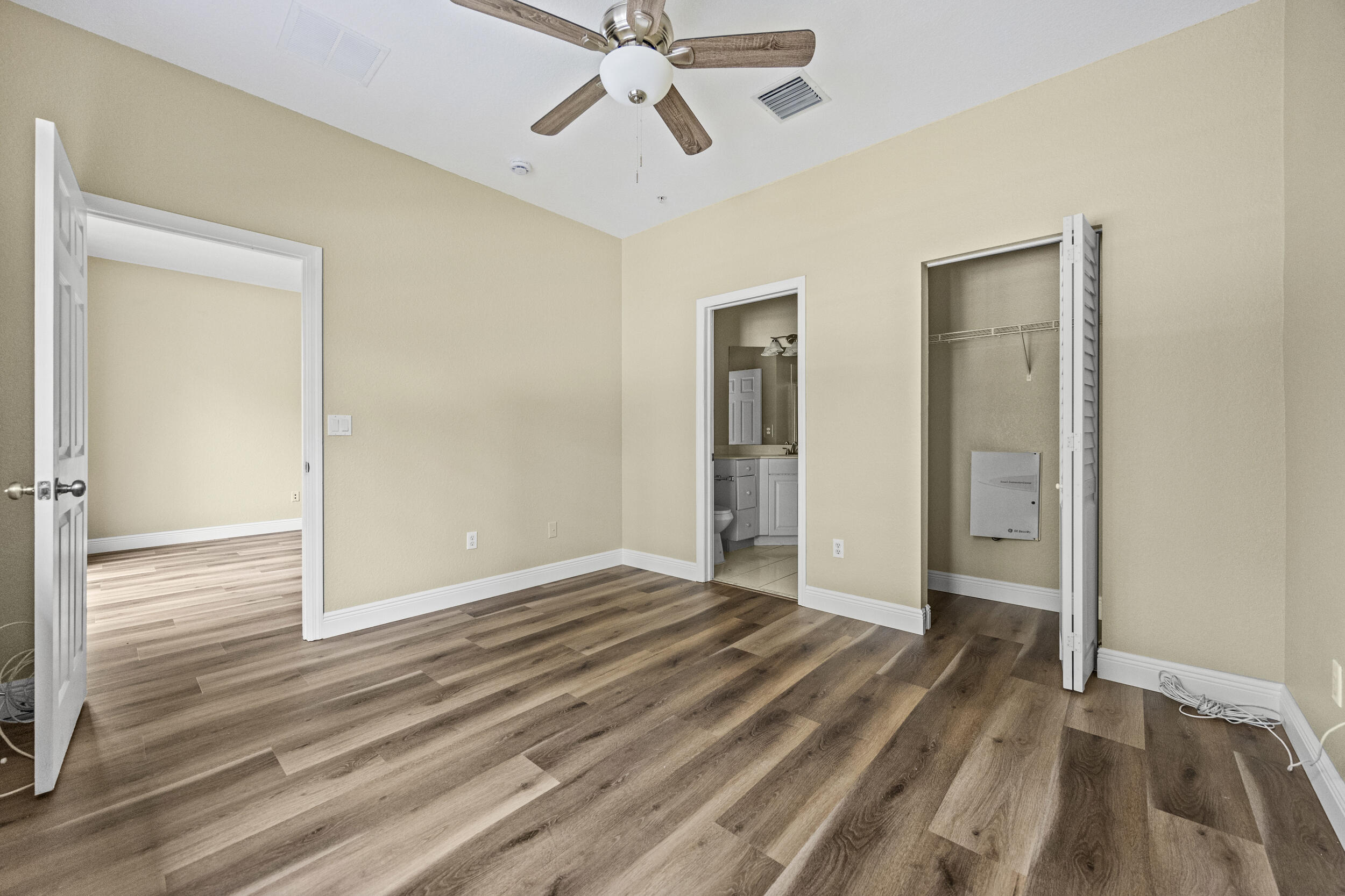 1982 Freeport Drive Riviera Beach, FL 33404 - Photo 20 of 29 a view of empty room with wooden floor