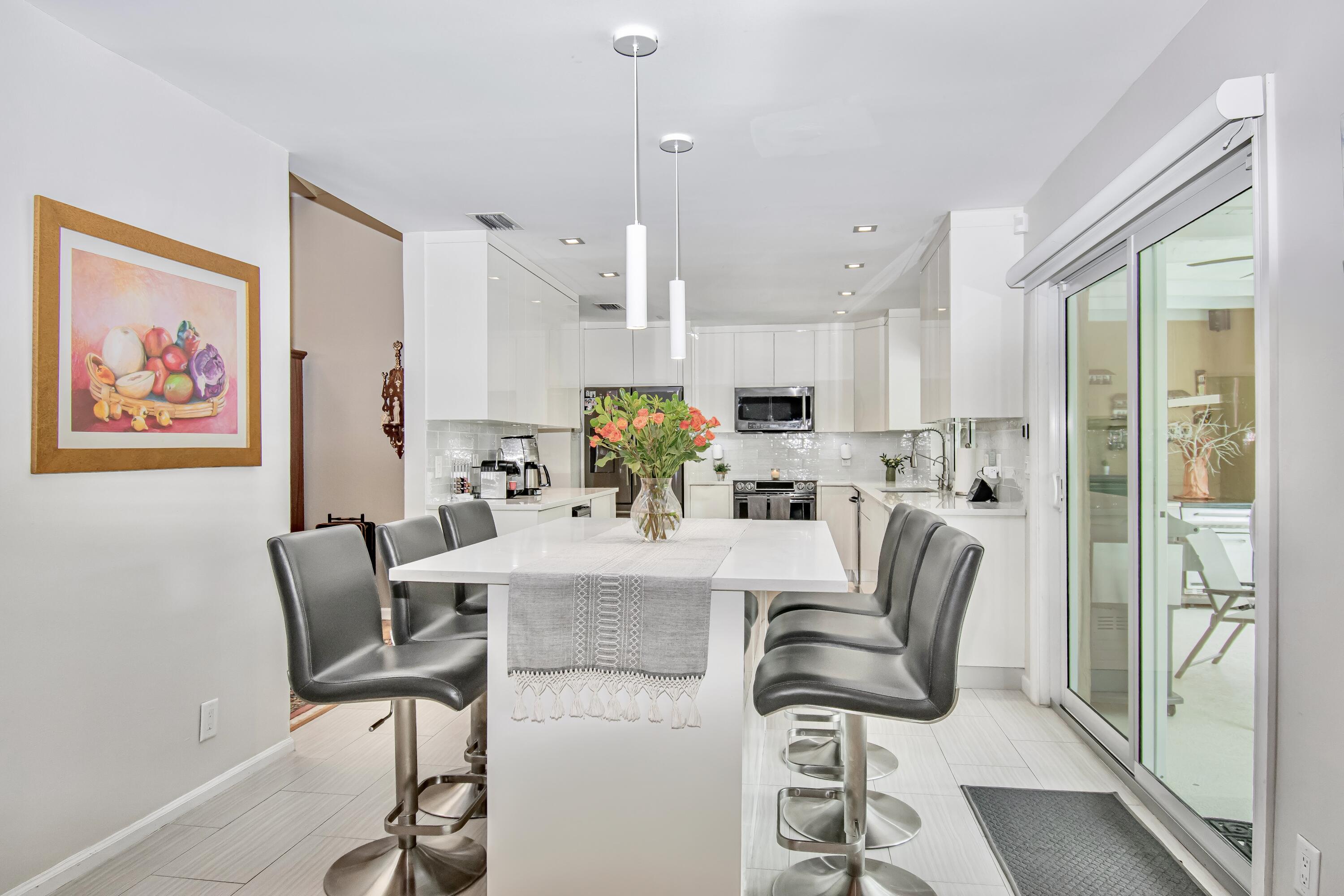 3961 Northwest 27th Avenue Boca Raton, FL 33434 - Photo 15 of 56 B5F01F8D-34CE-4C2E-8B7B-4CE98423001D