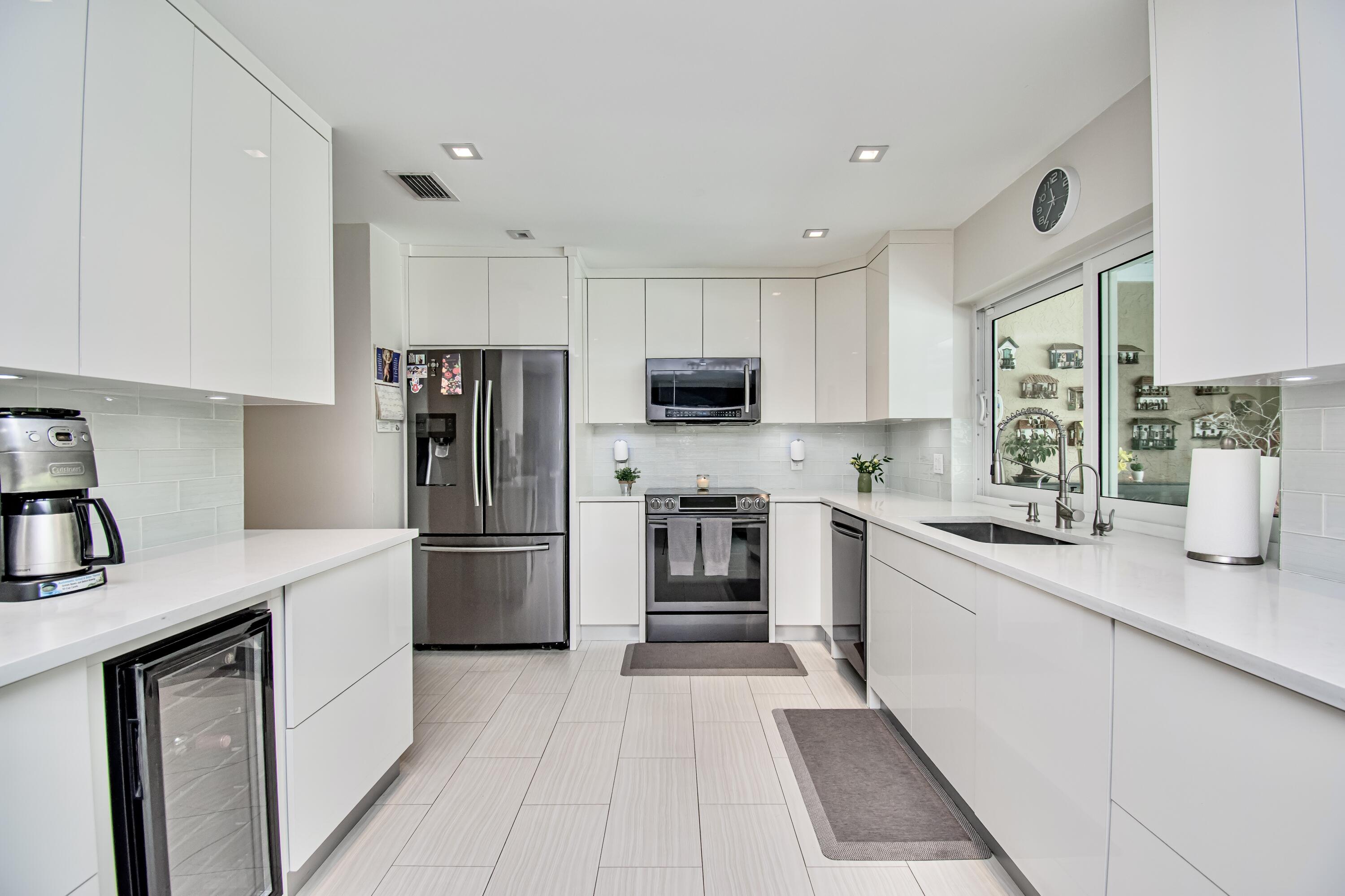 3961 Northwest 27th Avenue Boca Raton, FL 33434 - Photo 16 of 56 69F42B9F-3066-40D5-B554-8E4557C2FCD0