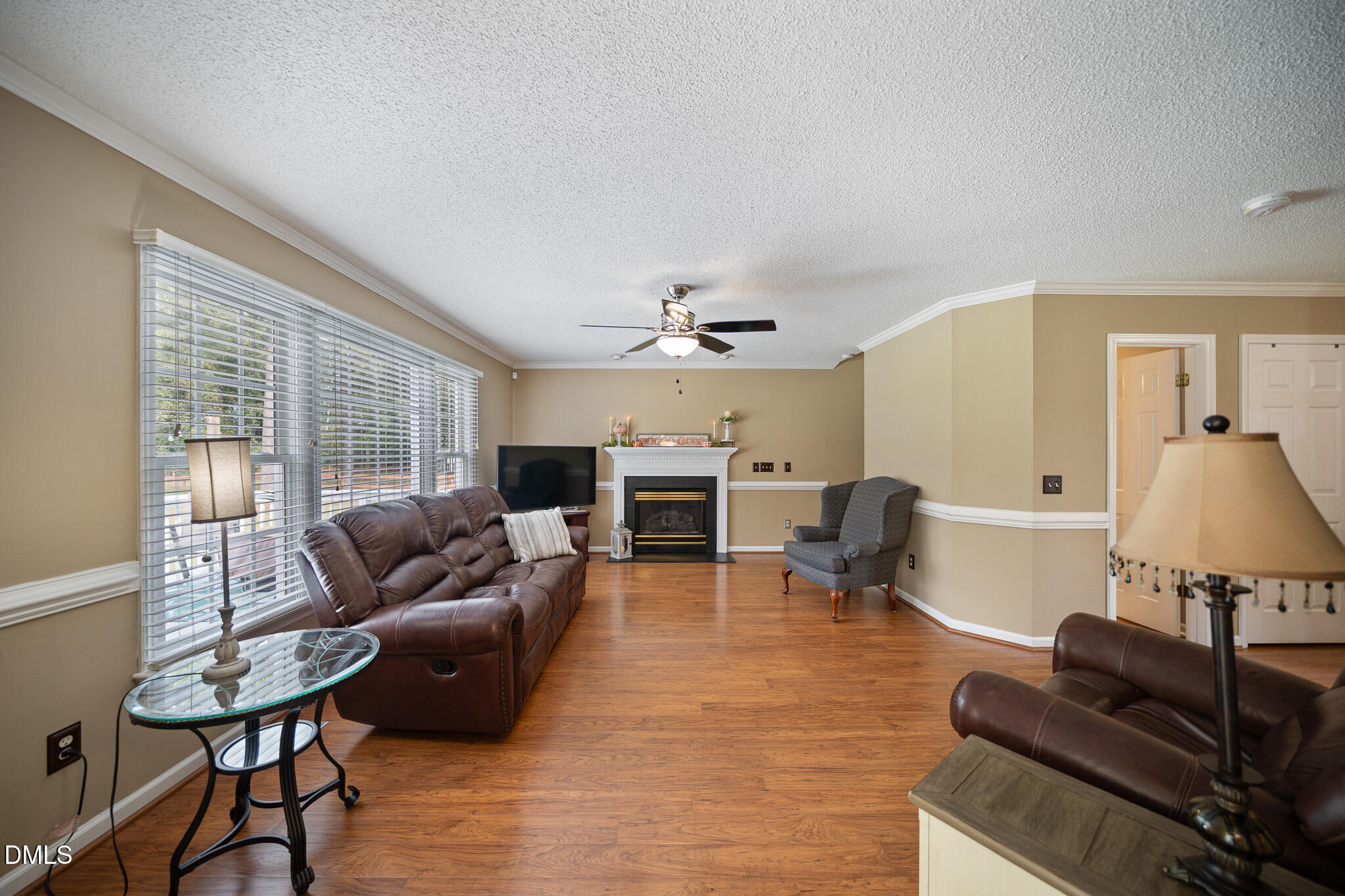 168 Tanning Ridge Drive Dunn, NC 28334 - Photo 11 of 33 a living room with furniture and a fireplace