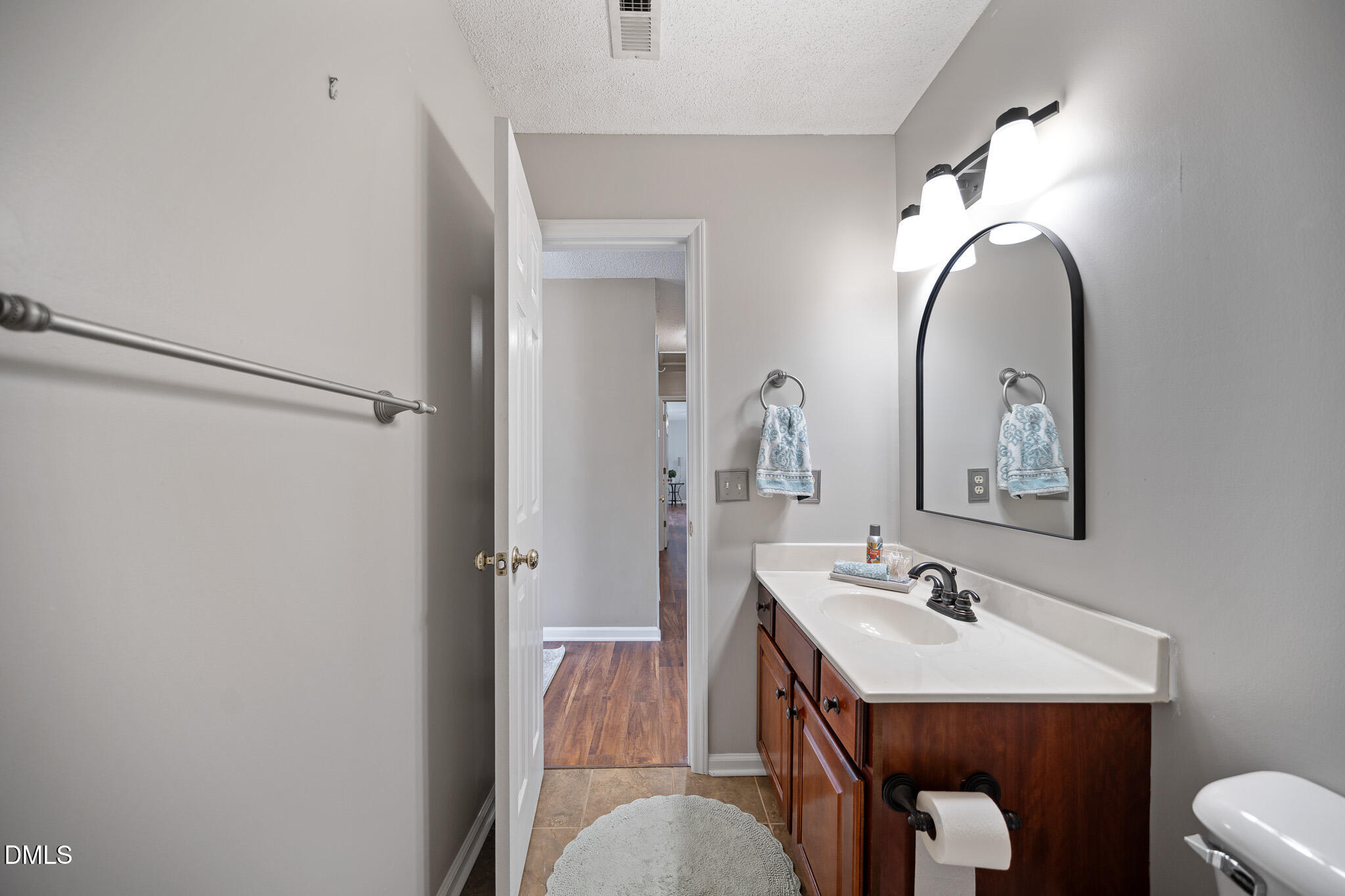 168 Tanning Ridge Drive Dunn, NC 28334 - Photo 18 of 33 a bathroom with a sink and a mirror