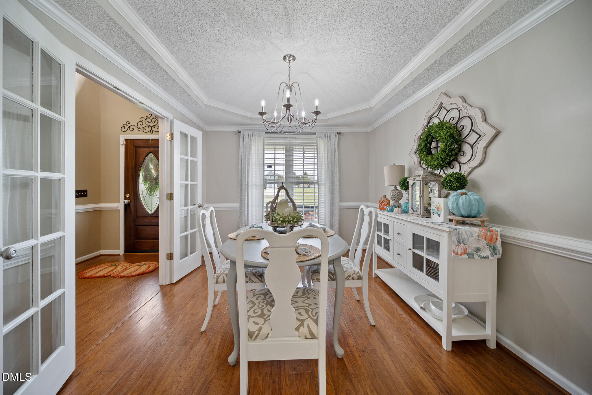 168 Tanning Ridge Drive Dunn, NC 28334 - Photo 2 of 33 a view of a dining room with furniture window and wooden floor