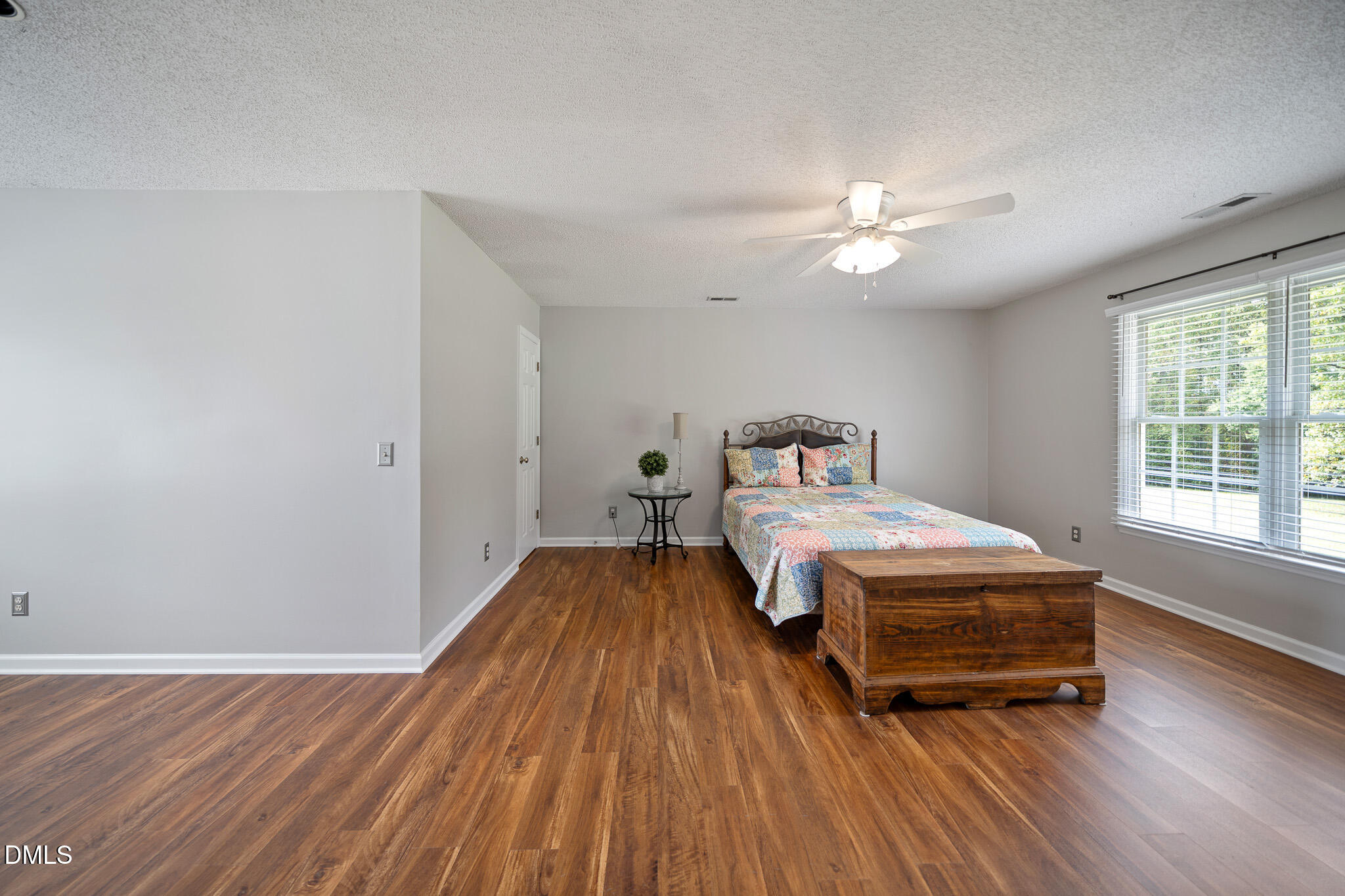 168 Tanning Ridge Drive Dunn, NC 28334 - Photo 31 of 33 a bedroom with a bed and a window