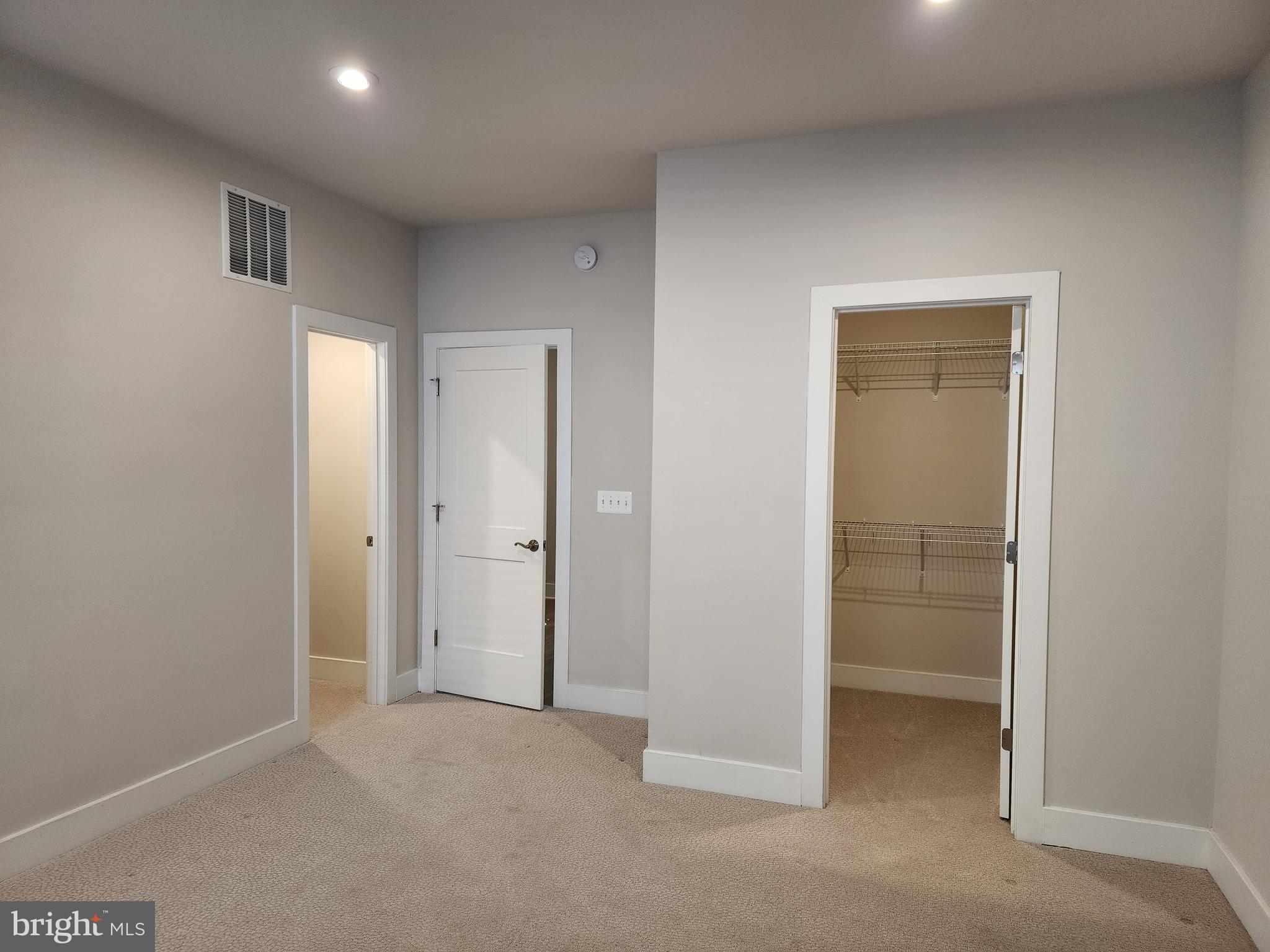 2391 Liberty Loop Herndon, VA 20171 - Photo 30 of 30 an empty room with closet and a bathroom