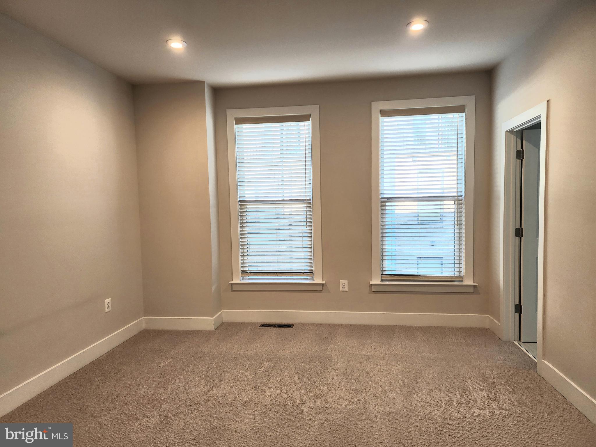 2391 Liberty Loop Herndon, VA 20171 - Photo 5 of 29 an empty room with a window