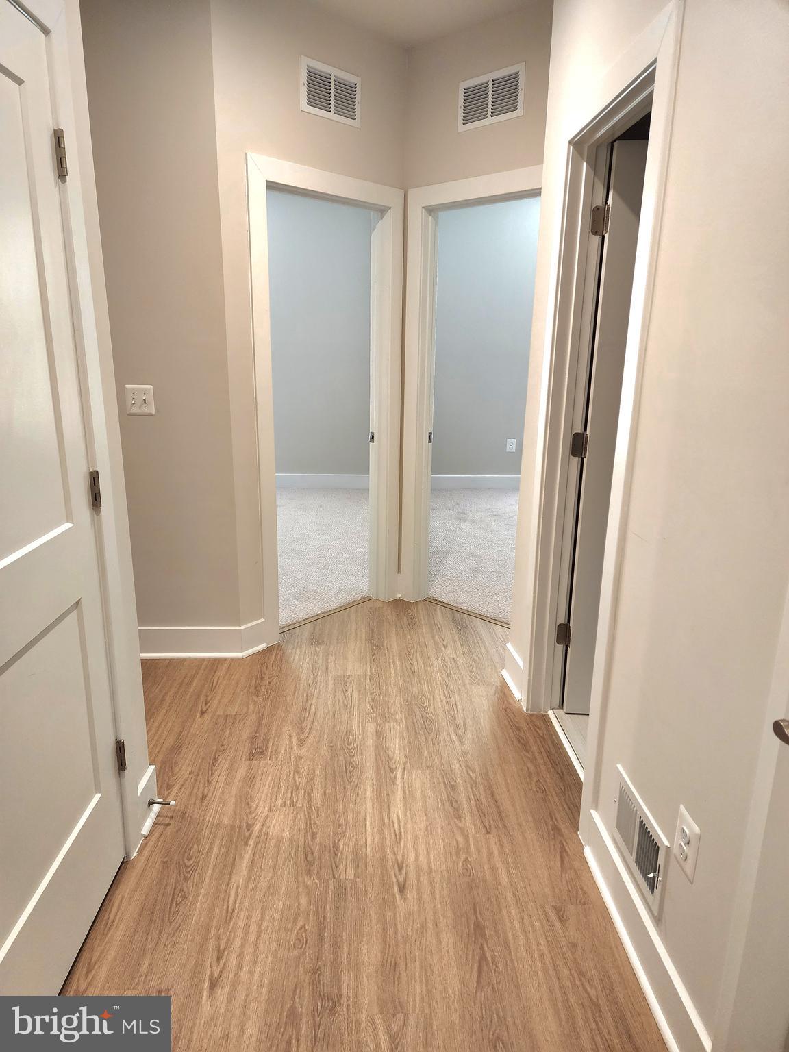 2391 Liberty Loop Herndon, VA 20171 - Photo 8 of 30 wooden floor in a gallery