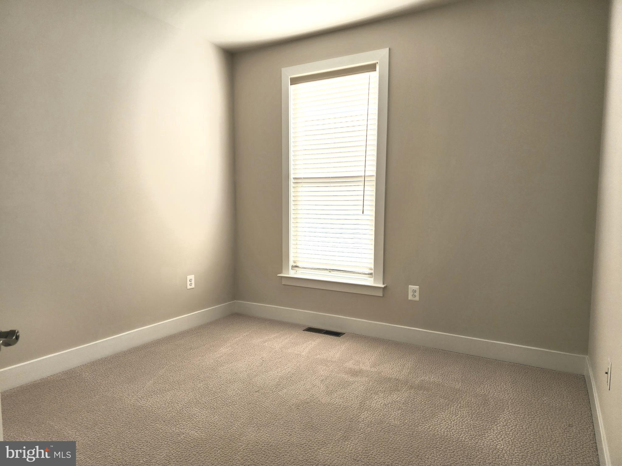 2391 Liberty Loop Herndon, VA 20171 - Photo 10 of 29 an empty room with a window