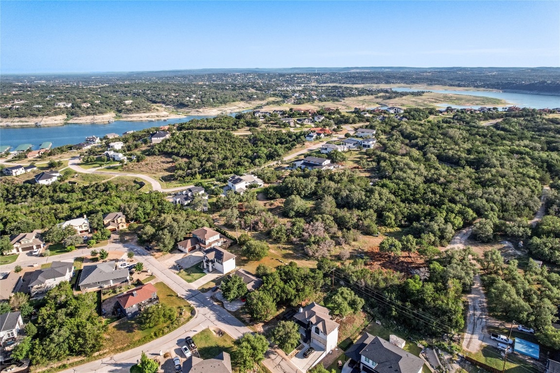 416 Summit Ridge Drive North Lago Vista, TX 78645 - Photo 13 of 18 an aerial view of residential building and ocean