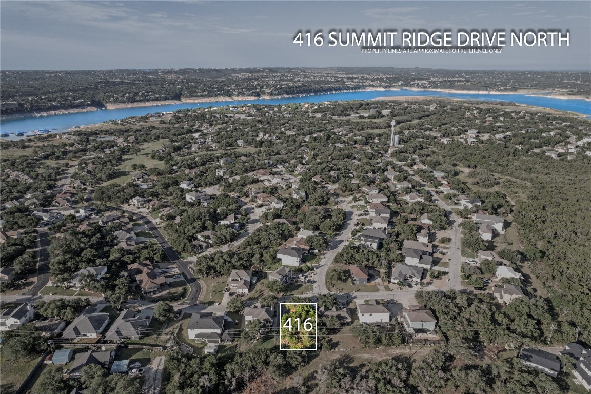 416 Summit Ridge Drive North Lago Vista, TX 78645 - Photo 17 of 18 a view of a field with an ocean view