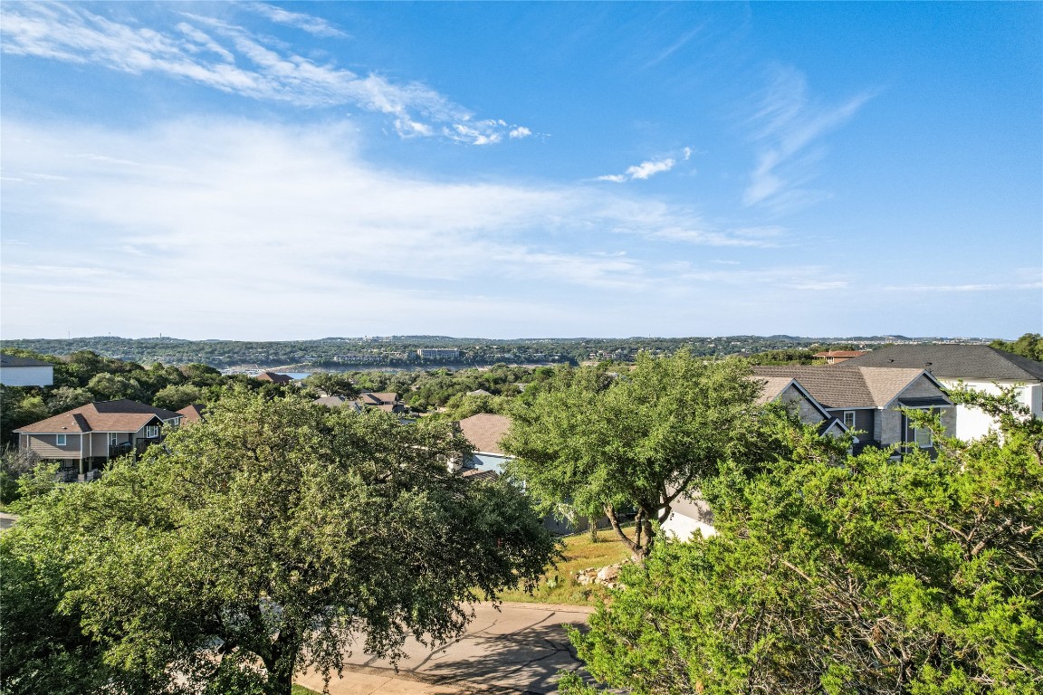416 Summit Ridge Drive North Lago Vista, TX 78645 - Photo 5 of 18 a view of a bunch of trees in a field