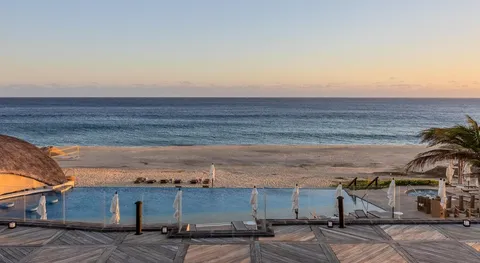 a view of a patio with swimming pool