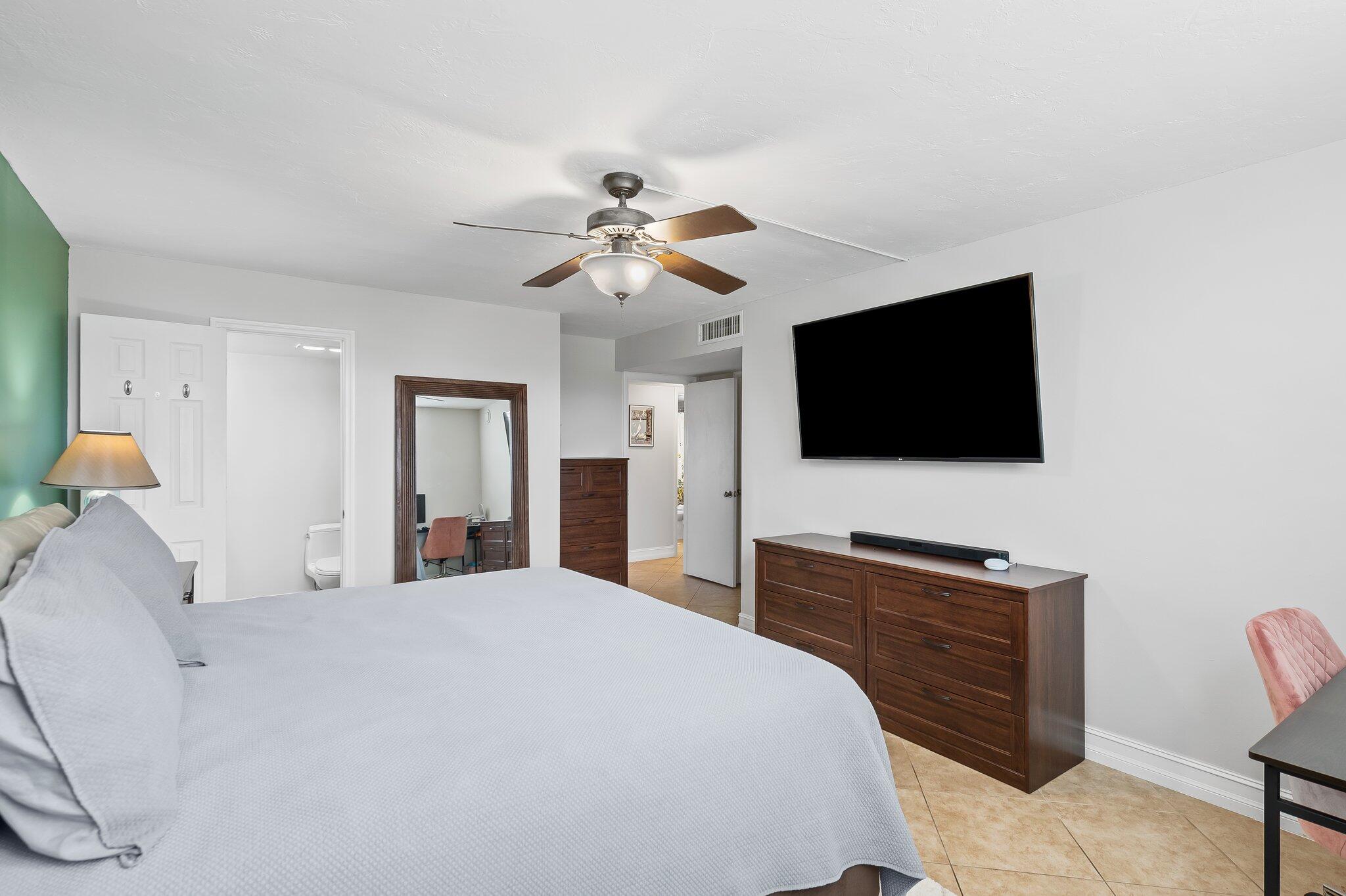 5961 Northwest 2nd Avenue, Unit 409 Boca Raton, FL 33487 - Photo 14 of 25 Primary Bedroom