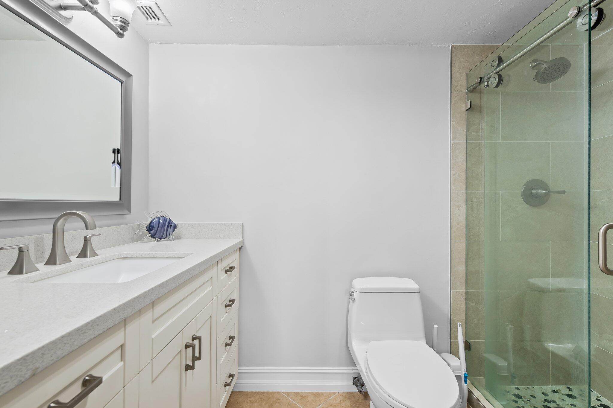 5961 Northwest 2nd Avenue, Unit 409 Boca Raton, FL 33487 - Photo 15 of 25 Primary Bathroom