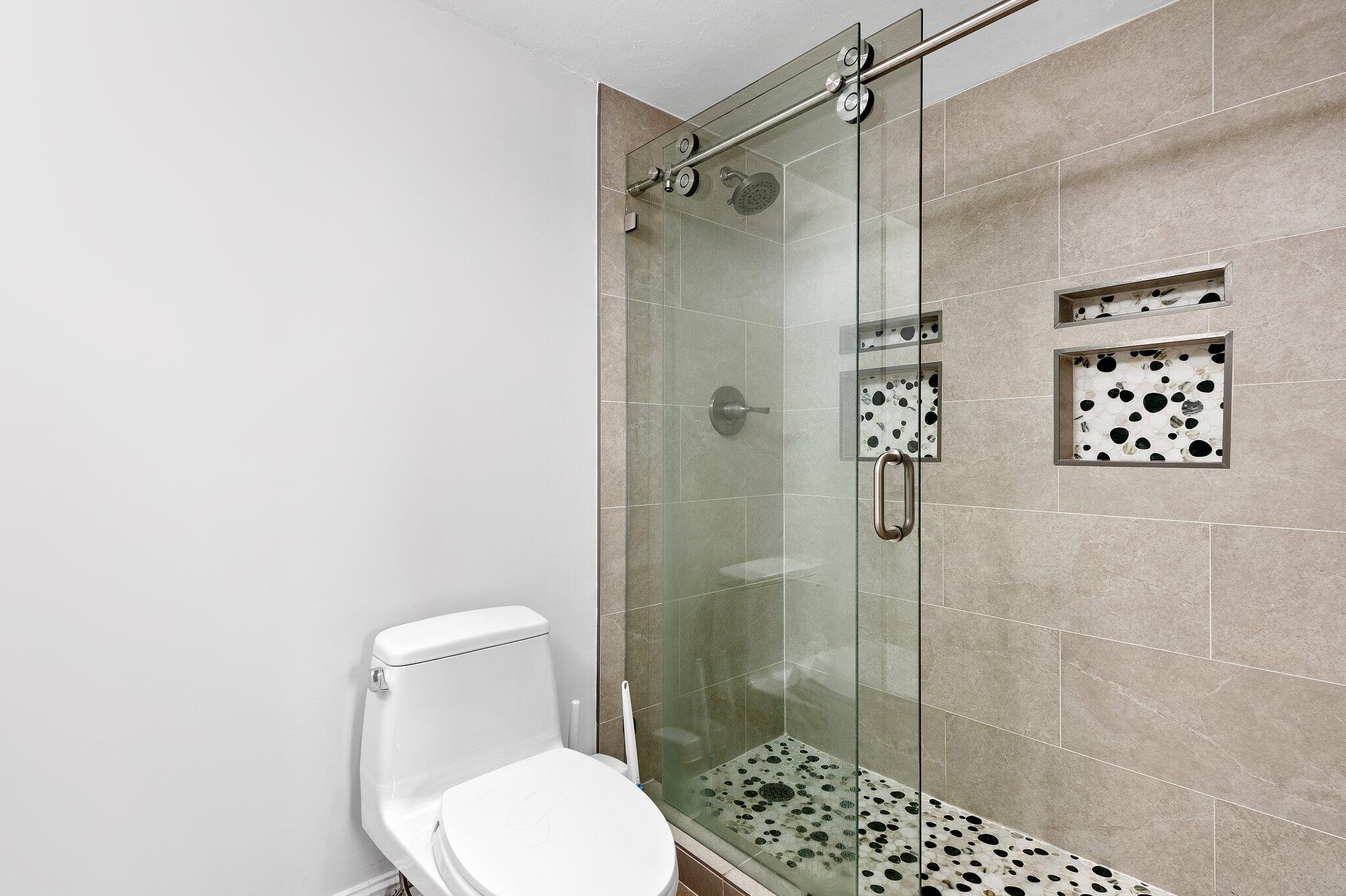 5961 Northwest 2nd Avenue, Unit 409 Boca Raton, FL 33487 - Photo 17 of 25 Primary Shower