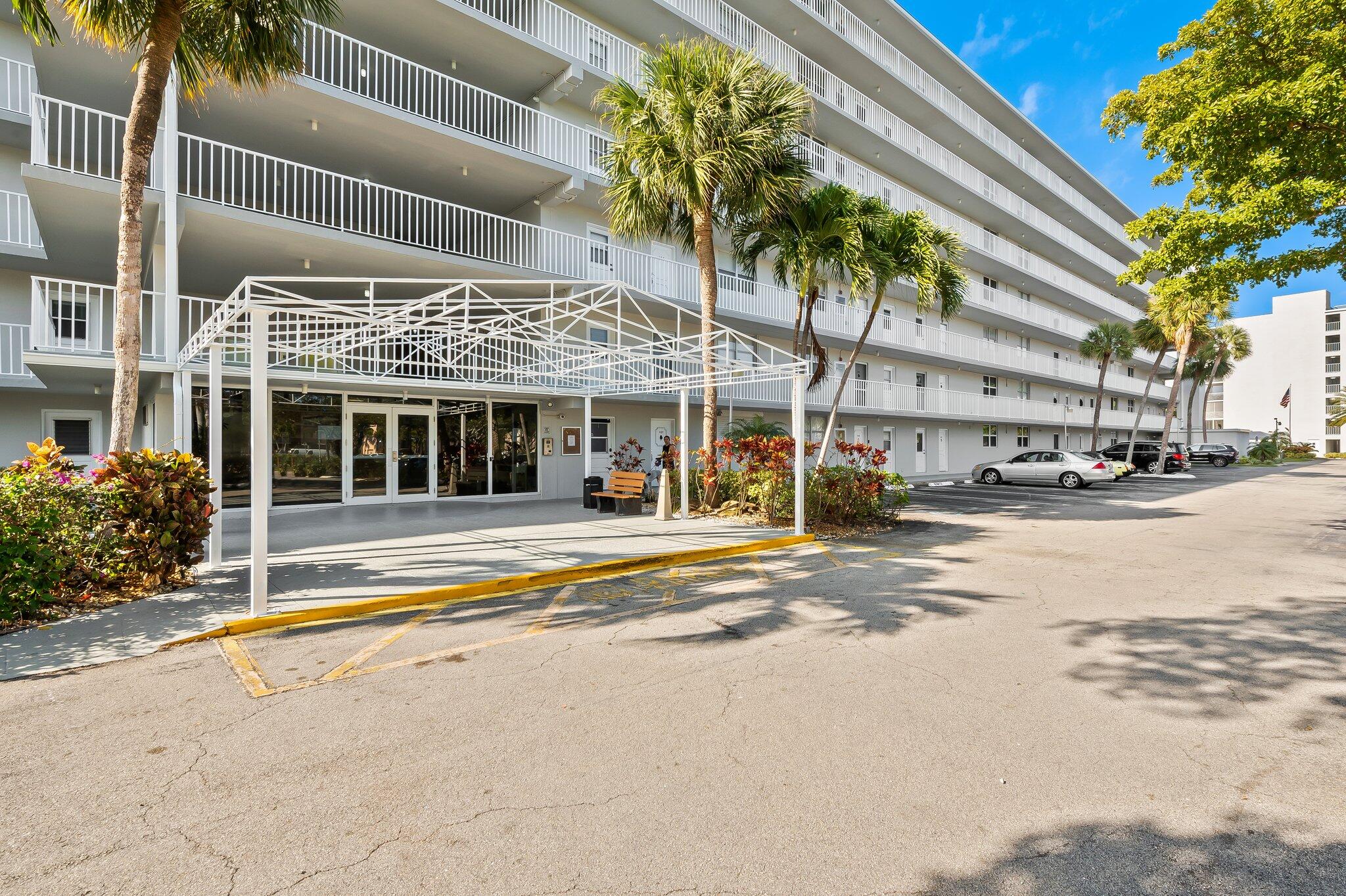 5961 Northwest 2nd Avenue, Unit 409 Boca Raton, FL 33487 - Photo 24 of 25 Condo Building Entrance