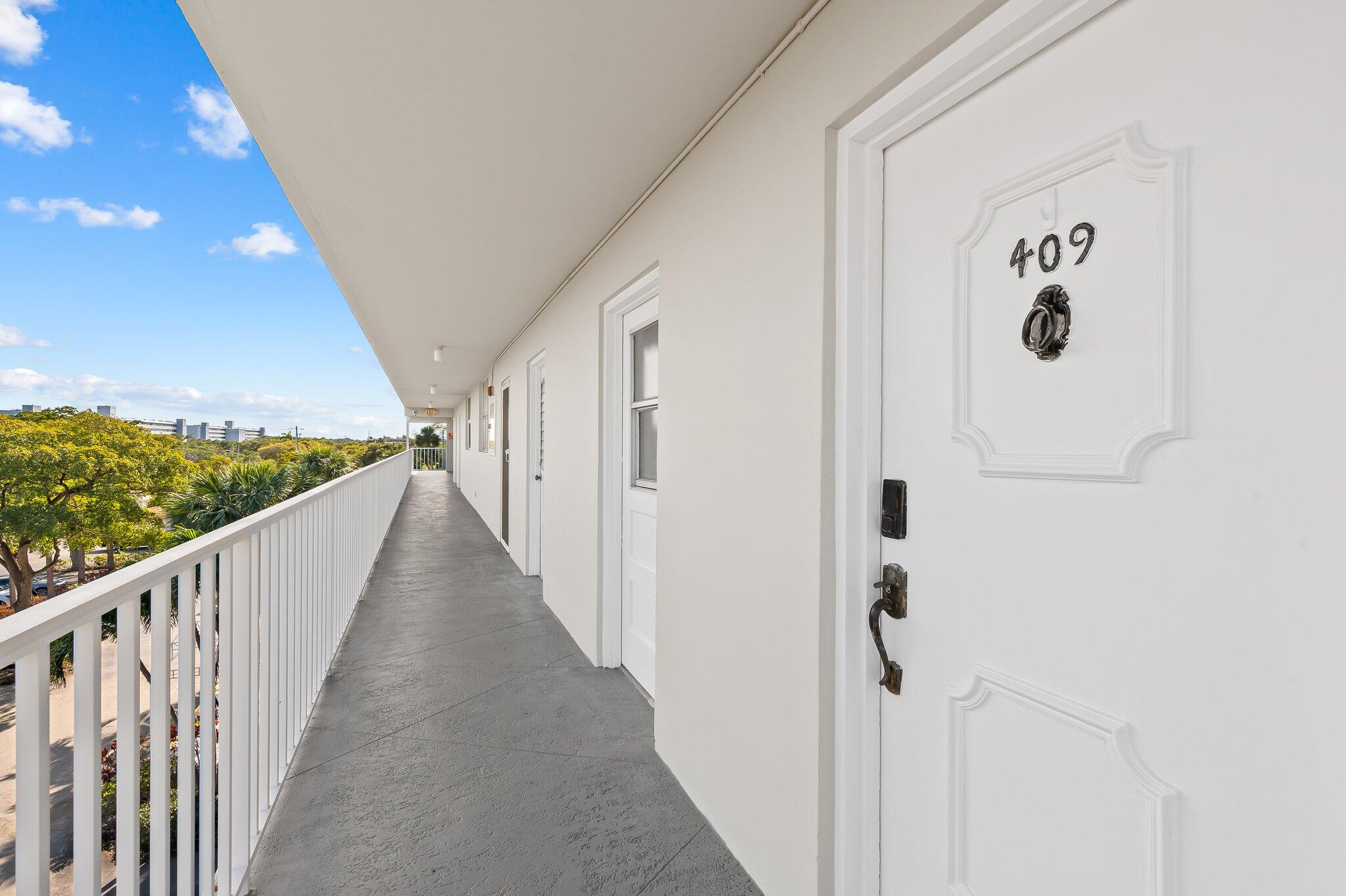 5961 Northwest 2nd Avenue, Unit 409 Boca Raton, FL 33487 - Photo 25 of 25 Unit Entrance