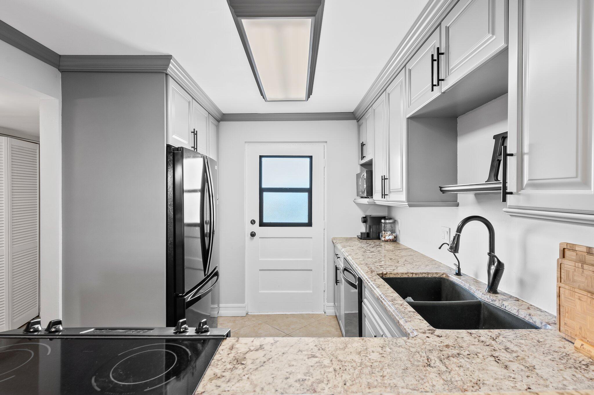 5961 Northwest 2nd Avenue, Unit 409 Boca Raton, FL 33487 - Photo 5 of 25 Kitchen