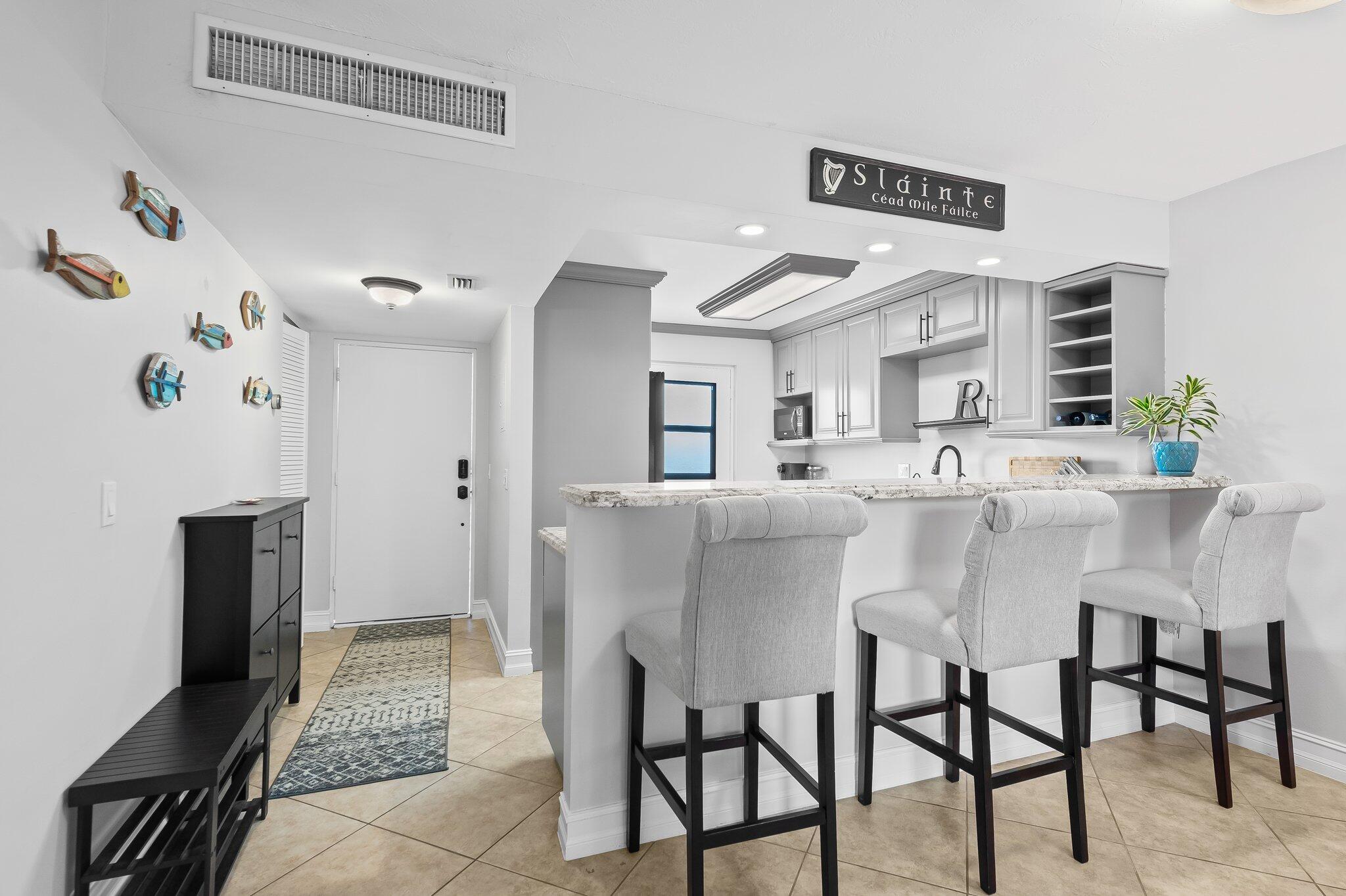 5961 Northwest 2nd Avenue, Unit 409 Boca Raton, FL 33487 - Photo 7 of 25 Kitchen Bar