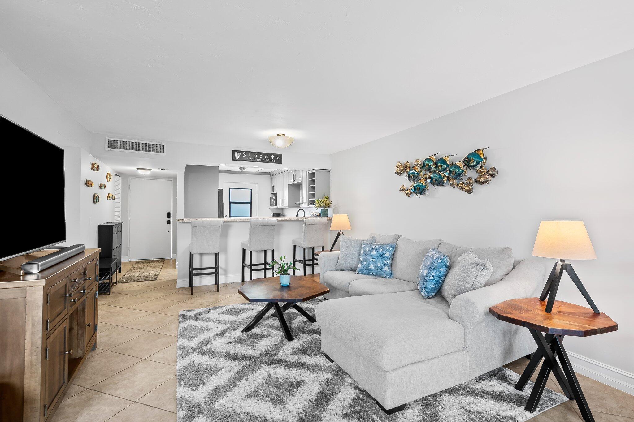 5961 Northwest 2nd Avenue, Unit 409 Boca Raton, FL 33487 - Photo 9 of 25 Living Room and Kitchen