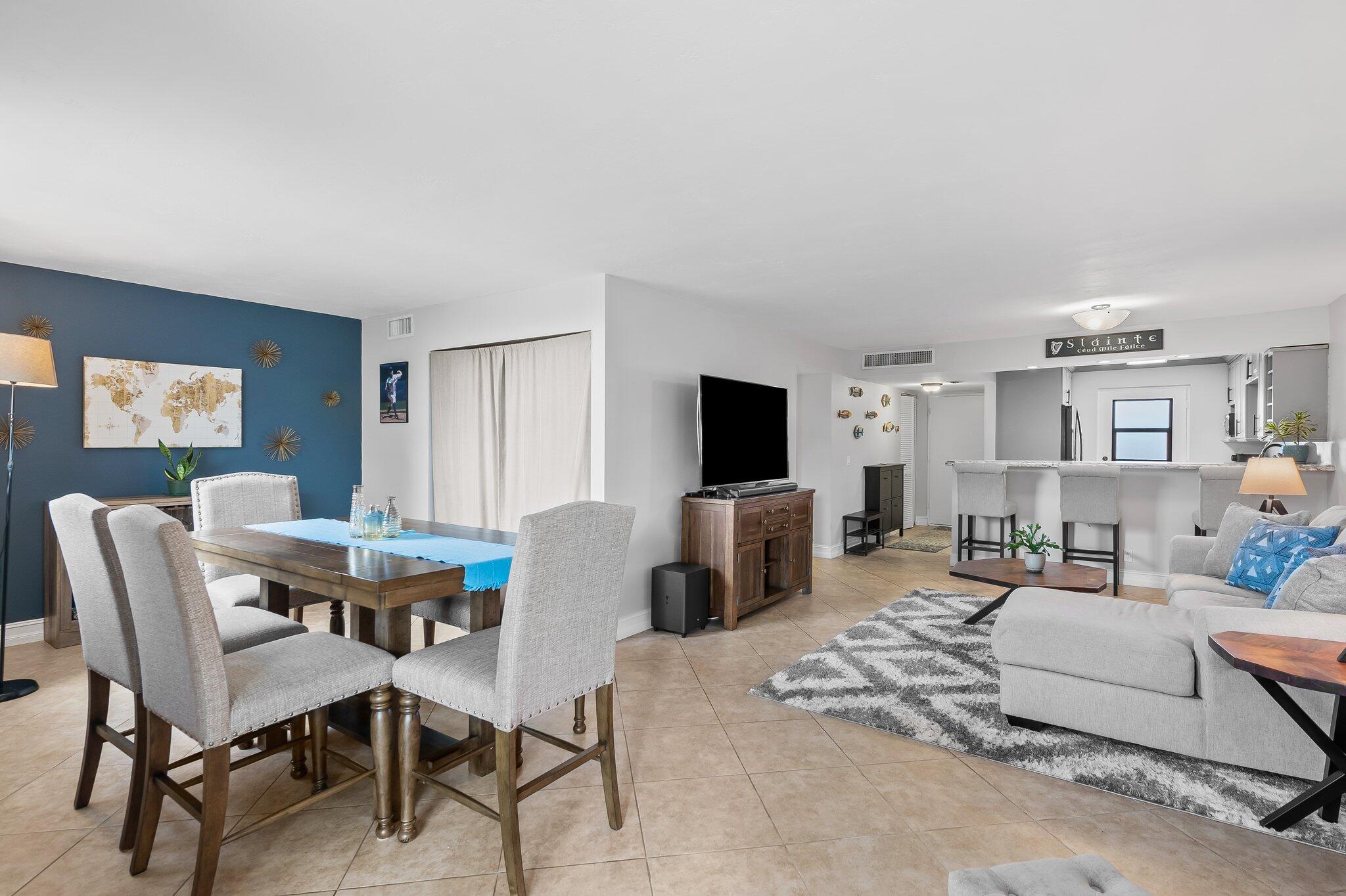 5961 Northwest 2nd Avenue, Unit 409 Boca Raton, FL 33487 - Photo 10 of 25 Dining and Living Room