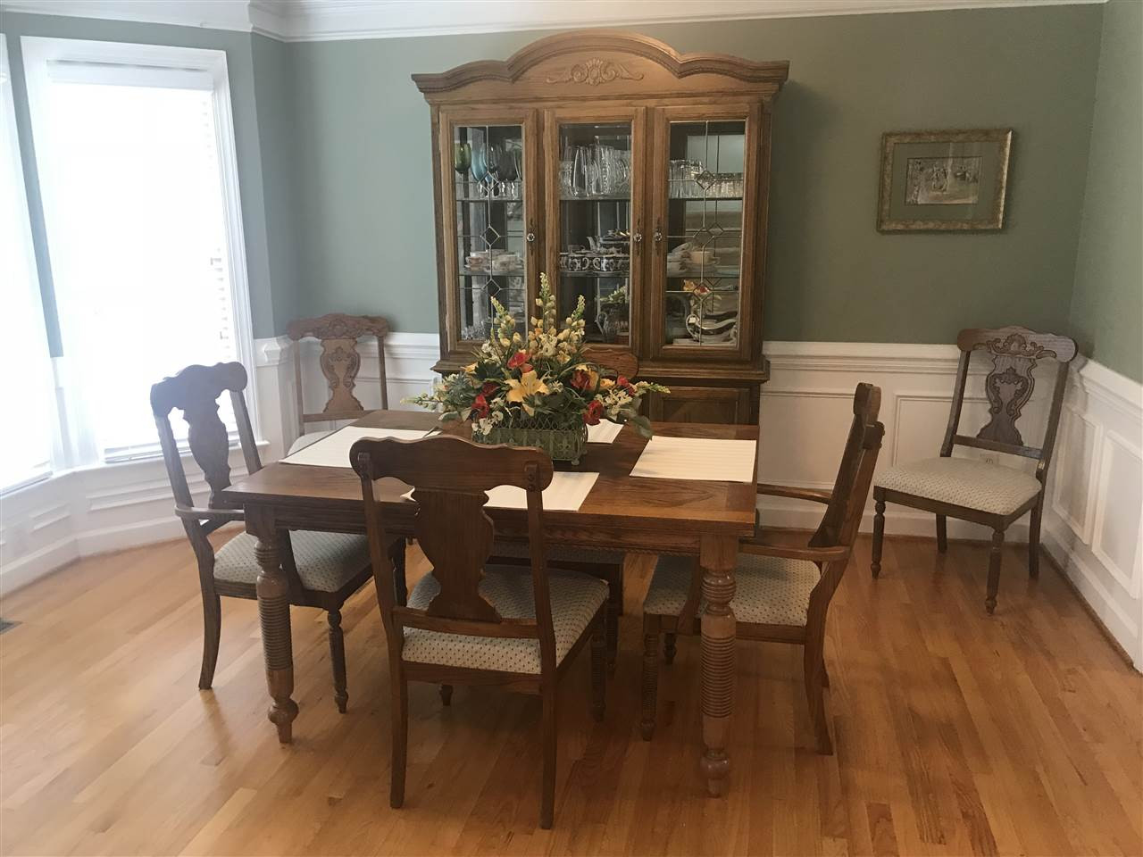 2900 Dahlgreen Road Raleigh, NC 27615 - Photo 1 of 25 Dining room with bay window, hardwood floors, crown, chair and picture frame moldings. Dining Room