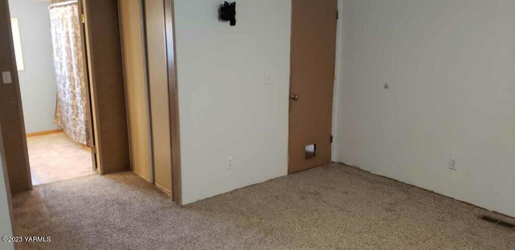 2833 Wiley Road Yakima, WA 98903 - Photo 12 of 17 a view of an empty room and a window
